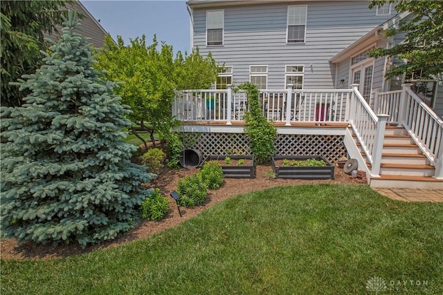 4560 James Madison Trl, Kettering, OH 45440 - rear view of house with a lawn, a deck, and stairs