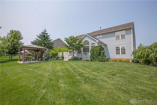 4560 James Madison Trl, Kettering, OH 45440 - back of property featuring a gazebo and a yard