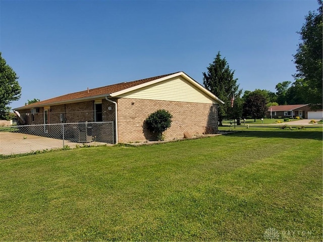 1261 Dusty Ln, West Alexandria, OH 45381 - view of home's exterior featuring brick siding