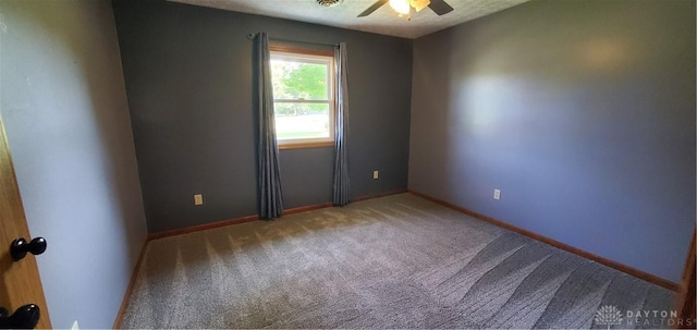 1261 Dusty Ln, West Alexandria, OH 45381 - empty room with ceiling fan, carpet floors, and baseboards