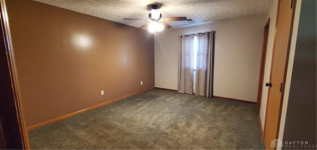 1261 Dusty Ln, West Alexandria, OH 45381 - carpeted spare room featuring a textured ceiling, a ceiling fan, and baseboards