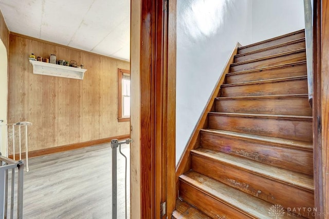 4975 Hamilton Eaton Rd, Hamilton, OH 45013 - stairs with wood finished floors, baseboards, and wooden walls