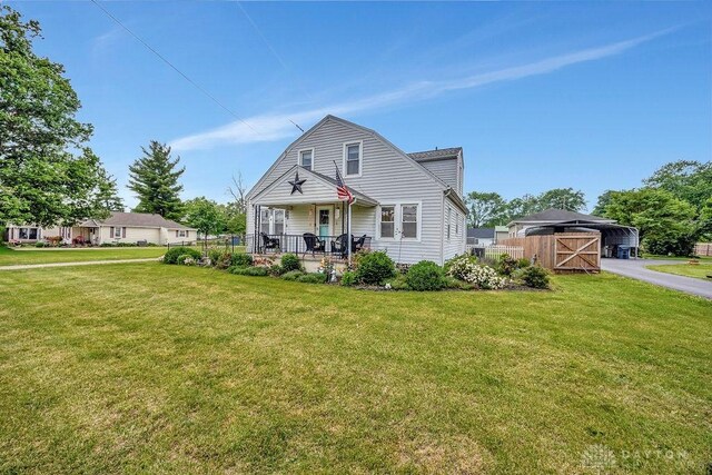 4975 Hamilton Eaton Rd, Hamilton, OH 45013 - view of front facade featuring a gate and covered porch