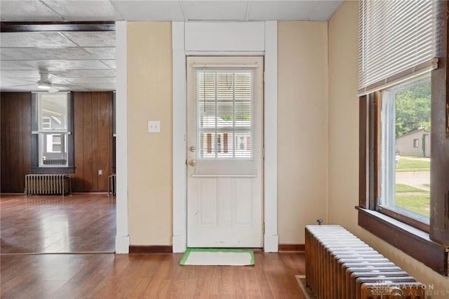 282 S W St, Xenia, OH 45385 - entryway featuring radiator, wood finished floors, and baseboards