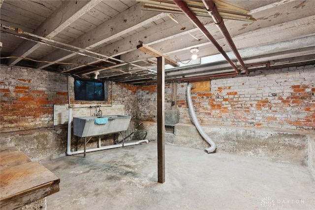 282 S W St, Xenia, OH 45385 - unfinished basement with a sink