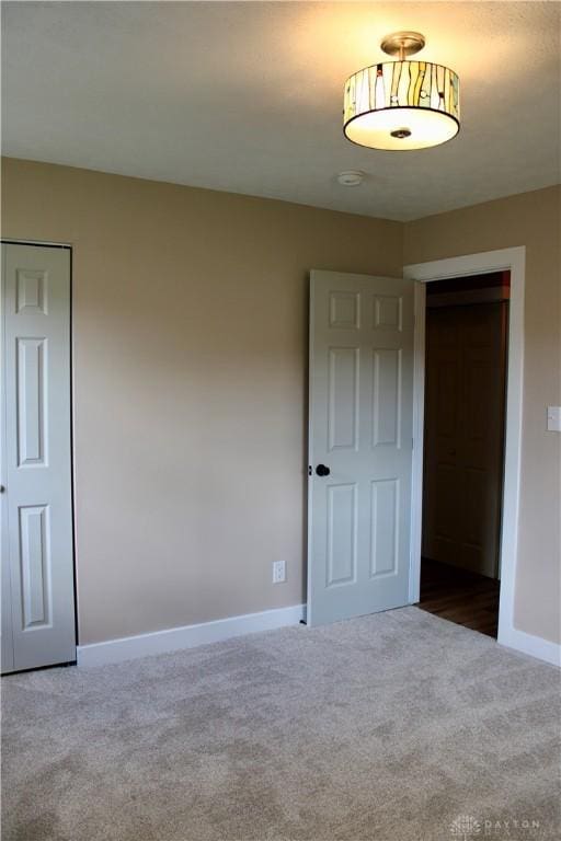 5317 Plainfield Rd, Dayton, OH 45432 - unfurnished bedroom featuring carpet flooring, baseboards, and a closet