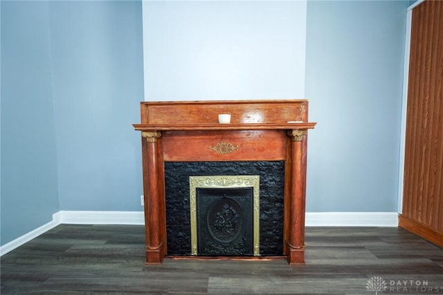 3409 E 5th St, Dayton, OH 45403 - detailed view of baseboards, wood finished floors, and a fireplace