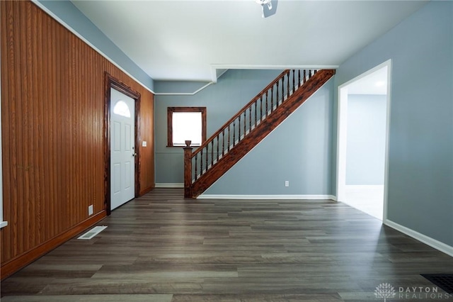 3409 E 5th St, Dayton, OH 45403 - foyer with stairway, baseboards, and wood finished floors