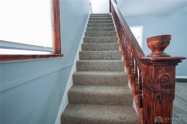 3409 E 5th St, Dayton, OH 45403 - staircase with baseboards and wood finished floors