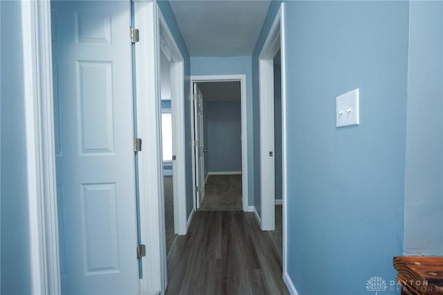 3409 E 5th St, Dayton, OH 45403 - corridor featuring baseboards and dark wood-type flooring