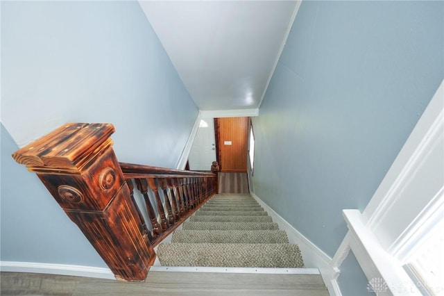 3409 E 5th St, Dayton, OH 45403 - staircase with baseboards and wood finished floors