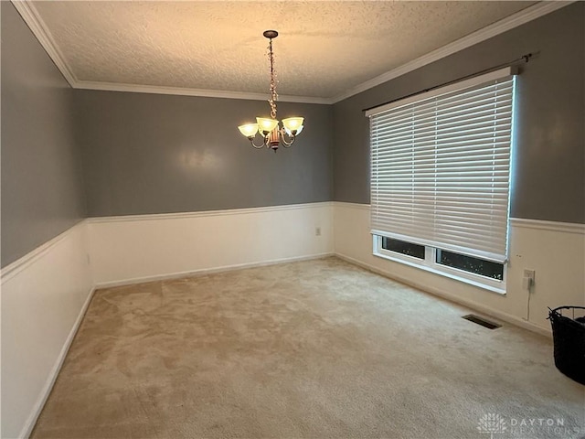 1529 Creekside Rd, Amelia, OH 45102 - carpeted empty room featuring a chandelier, a textured ceiling, crown molding, and baseboards