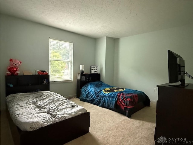 1529 Creekside Rd, Amelia, OH 45102 - bedroom with carpet flooring and a textured ceiling