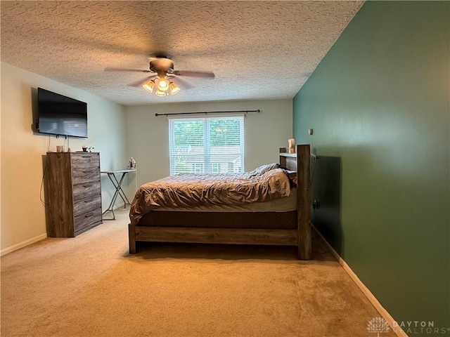 1529 Creekside Rd, Amelia, OH 45102 - bedroom with carpet flooring, a textured ceiling, a ceiling fan, and baseboards