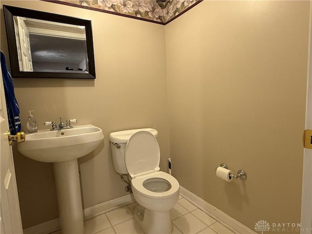 1529 Creekside Rd, Amelia, OH 45102 - bathroom featuring toilet, tile patterned flooring, and baseboards