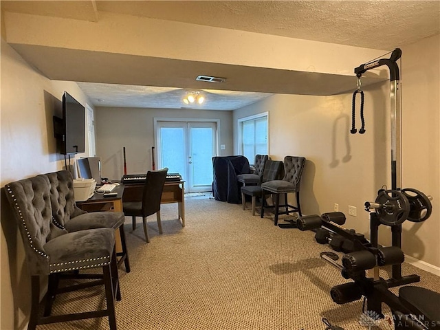 1529 Creekside Rd, Amelia, OH 45102 - living area featuring light carpet and a textured ceiling