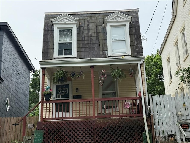3433 Moulton Ave, Cincinnati, OH 45205 - view of front facade with a porch and mansard roof