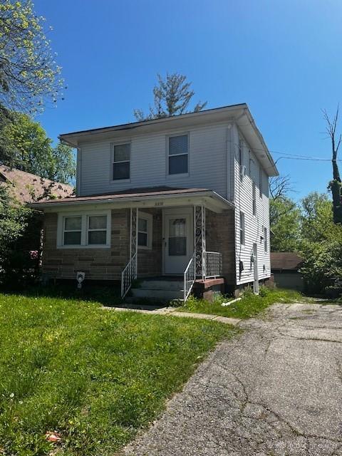 2218 Rugby Rd, Dayton, OH 45406 - view of front of house with covered porch and a front yard