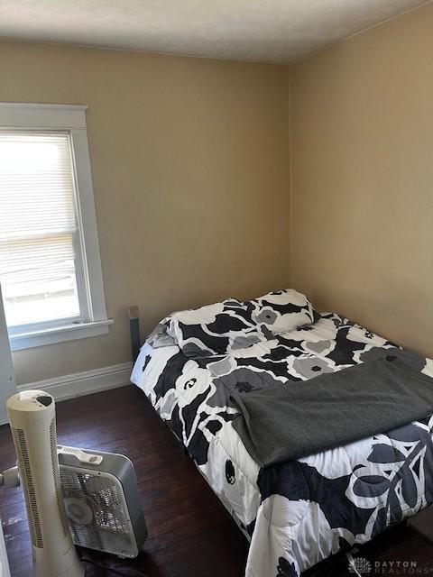 2218 Rugby Rd, Dayton, OH 45406 - bedroom featuring wood finished floors and baseboards