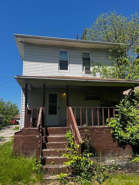 2218 Rugby Rd, Dayton, OH 45406 - view of front of home with covered porch and cooling unit