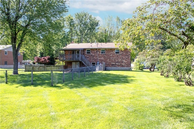 2706 Coldsprings Dr, Beavercreek, OH 45434 - view of yard featuring a wooden deck and stairs