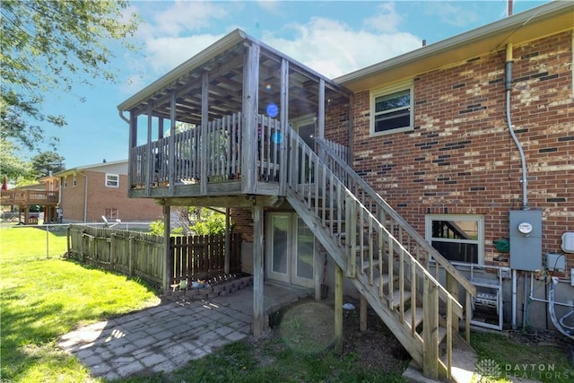 2706 Coldsprings Dr, Beavercreek, OH 45434 - back of property with brick siding, stairs, and a deck
