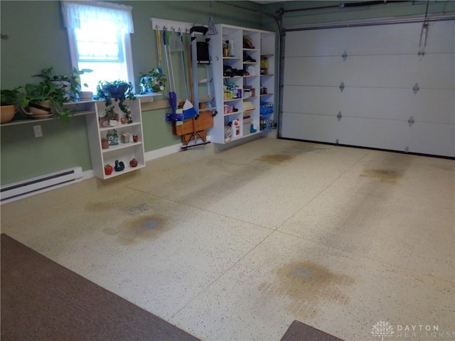4502 Central Ave, Middletown, OH 45044 - garage featuring a baseboard radiator