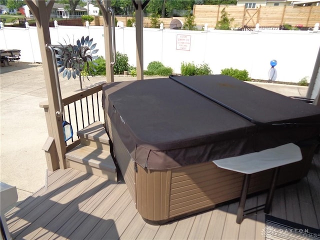 4502 Central Ave, Middletown, OH 45044 - wooden deck featuring a hot tub and a patio area
