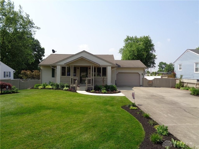 4502 Central Ave, Middletown, OH 45044 - view of front facade featuring concrete driveway, an attached garage, and a shingled roof