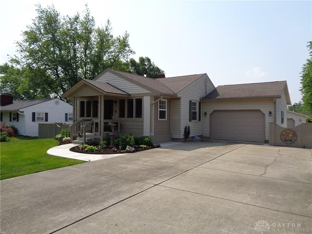 4502 Central Ave, Middletown, OH 45044 - ranch-style home featuring a garage, driveway, and roof with shingles