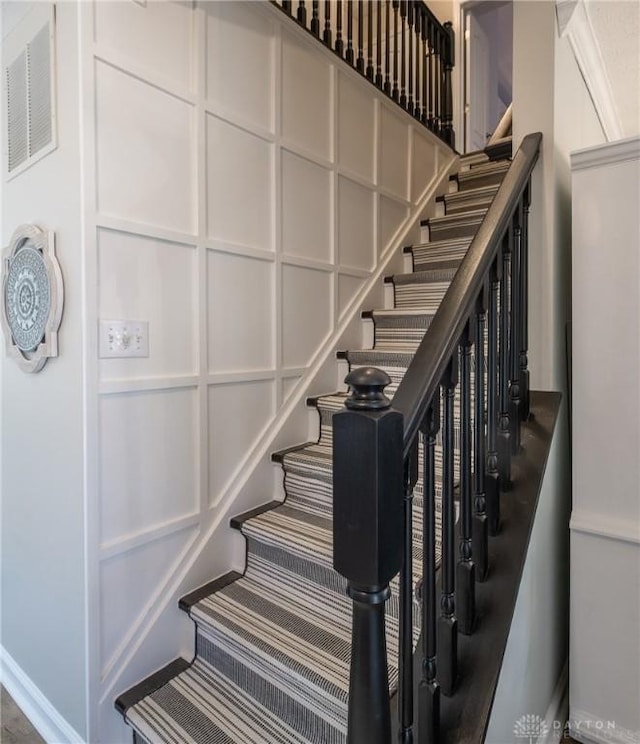 1199 Whitetail Dr, Fairborn, OH 45324 - staircase with carpet flooring