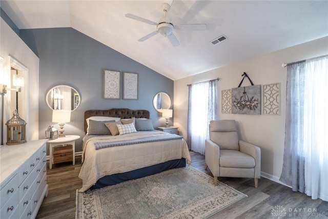 1199 Whitetail Dr, Fairborn, OH 45324 - bedroom featuring vaulted ceiling, dark wood-style floors, and a ceiling fan