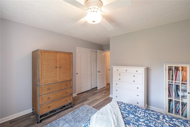 1199 Whitetail Dr, Fairborn, OH 45324 - bedroom with wood finished floors, baseboards, and a ceiling fan