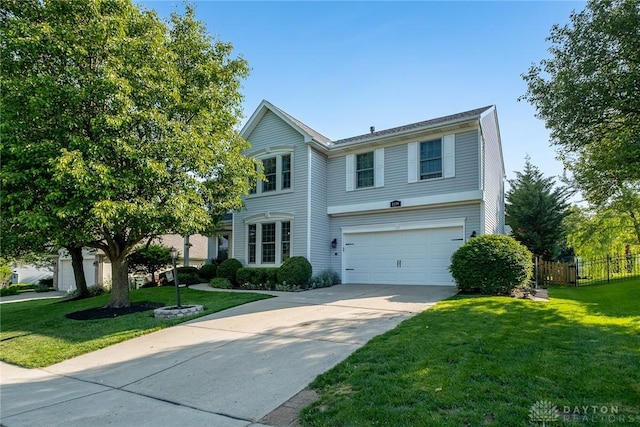 1199 Whitetail Dr, Fairborn, OH 45324 - traditional-style home with driveway and a garage