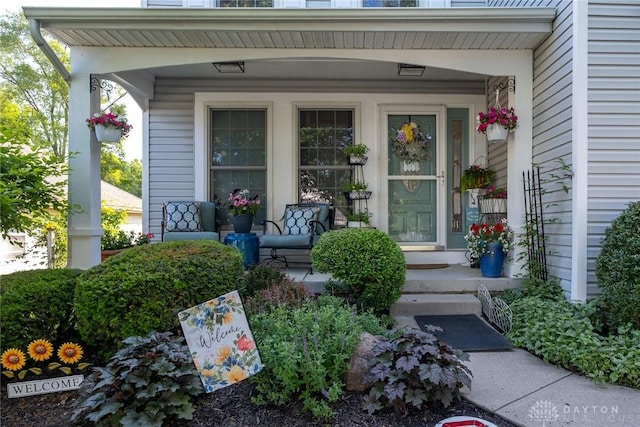 1199 Whitetail Dr, Fairborn, OH 45324 - property entrance featuring a porch
