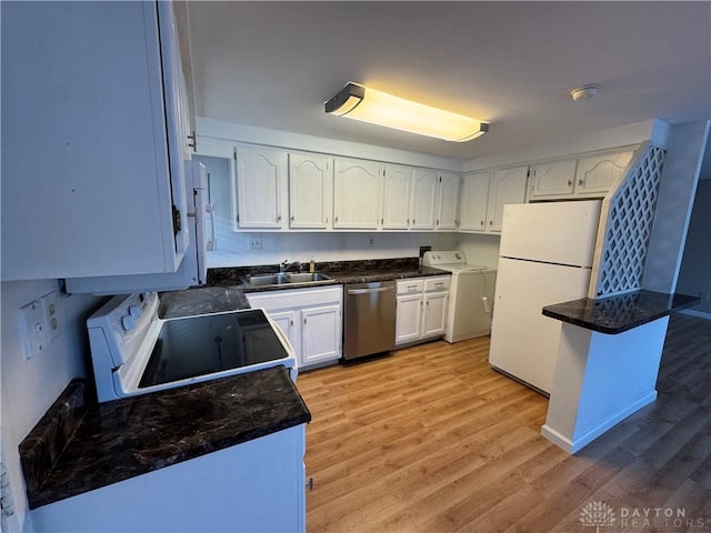 3645 Endover Rd, Dayton, OH 45439 - kitchen featuring white appliances, a sink, light wood-type flooring, white cabinetry, and washer and dryer