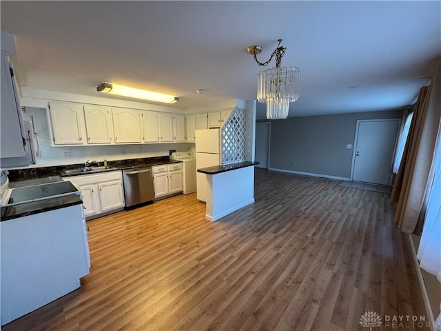 3645 Endover Rd, Dayton, OH 45439 - kitchen with stainless steel dishwasher, a chandelier, dark countertops, and open floor plan
