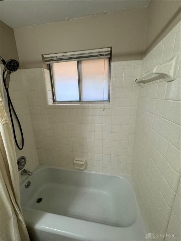3645 Endover Rd, Dayton, OH 45439 - bathroom featuring plenty of natural light and shower / tub combo