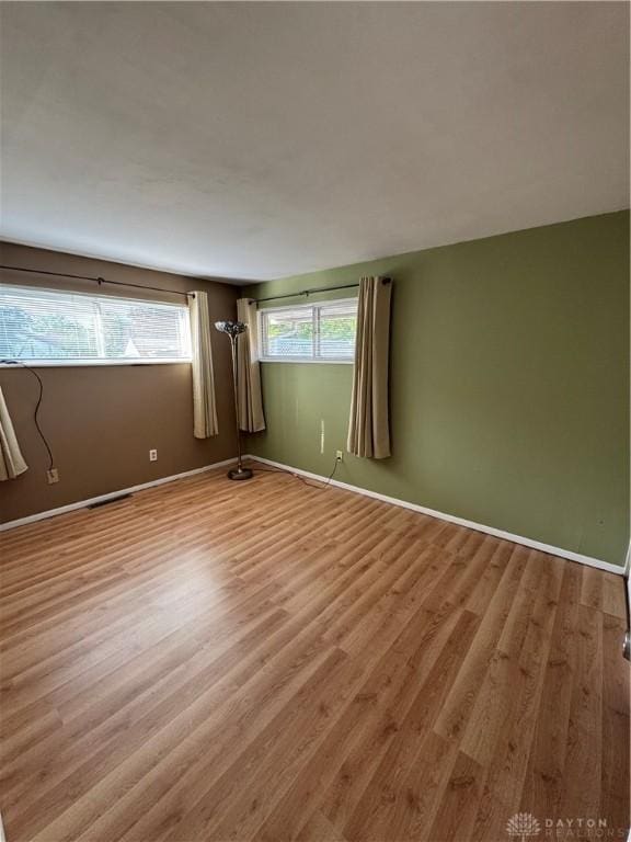 3645 Endover Rd, Dayton, OH 45439 - spare room featuring wood finished floors and baseboards