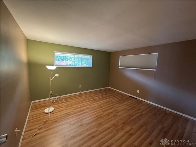 3645 Endover Rd, Dayton, OH 45439 - unfurnished room featuring wood finished floors and baseboards