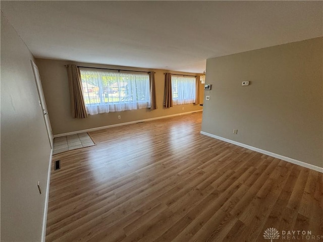 3645 Endover Rd, Dayton, OH 45439 - spare room with wood finished floors and baseboards
