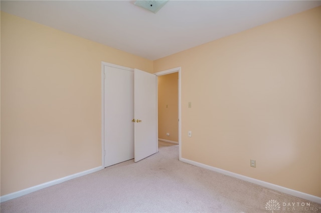 4424 Appleton Pl, Kettering, OH 45440 - empty room featuring light colored carpet and baseboards