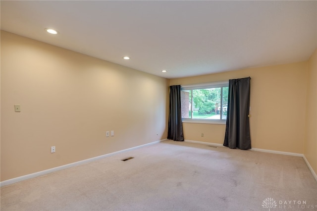 4424 Appleton Pl, Kettering, OH 45440 - empty room featuring recessed lighting and light carpet
