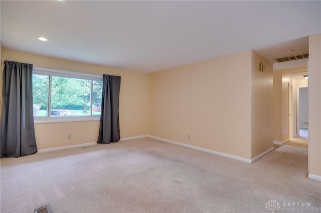 4424 Appleton Pl, Kettering, OH 45440 - spare room with light carpet and recessed lighting
