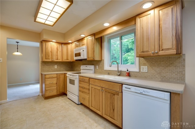 4424 Appleton Pl, Kettering, OH 45440 - kitchen with white appliances, light countertops, decorative backsplash, recessed lighting, and light brown cabinetry