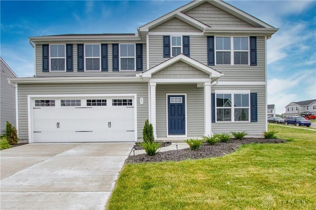 95 Whitney Way, West Milton, OH 45383 - view of front facade with a front yard, a garage, and driveway