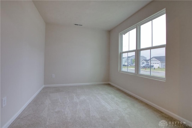 95 Whitney Way, West Milton, OH 45383 - spare room with light colored carpet and baseboards