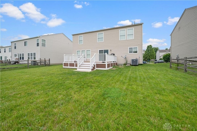 1750 Greentree Meadows Dr, Lebanon, OH 45036 - rear view of property with a wooden deck and central AC
