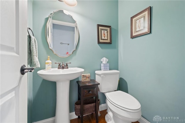 1750 Greentree Meadows Dr, Lebanon, OH 45036 - bathroom with toilet, wood finished floors, and baseboards