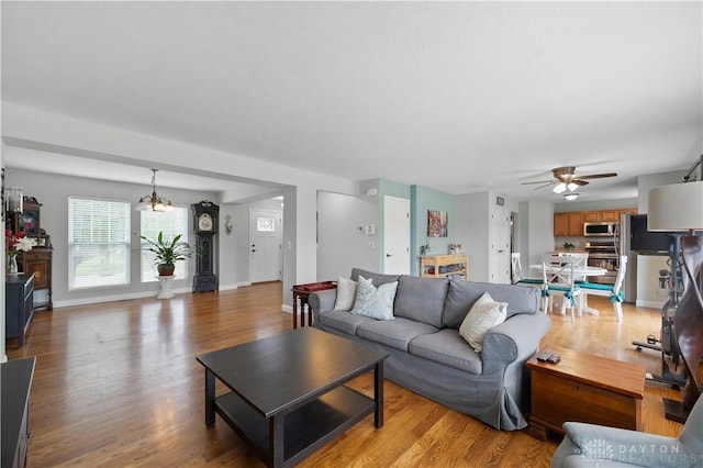1750 Greentree Meadows Dr, Lebanon, OH 45036 - living area featuring a ceiling fan, light wood finished floors, baseboards, and a chandelier